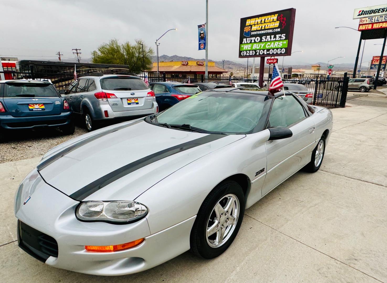 1999 Silver Chevrolet Camaro Z28 Coupe (2G1FP22G5X2) with an 5.7L V8 OHV 16V engine, located at 2190 Hwy 95, Bullhead City, AZ, 86442, (928) 704-0060, 0.000000, 0.000000 - 1999 Chevrolet Camaro Z28. automatic. leather interior. T bar roof. 19 ' premium wheels. This car has always been garaged. Show car condition. Runs and drives great. Free and clear title. Clean carfax. - Photo#0